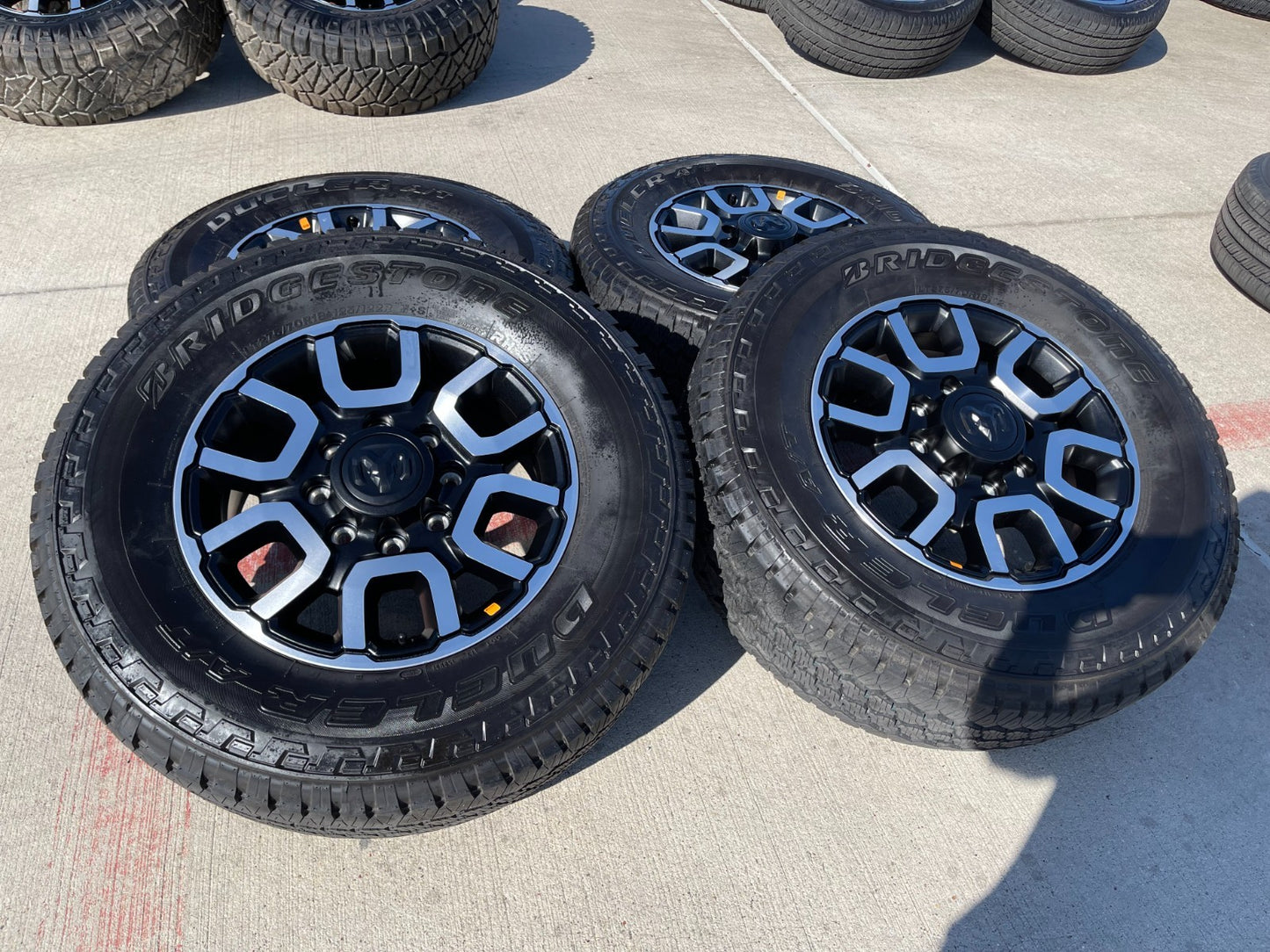 18" Ram 2500 3500 LARAMIE OEM wheels rims 2694 tires BRIDGESTONE A/T NEW 2026