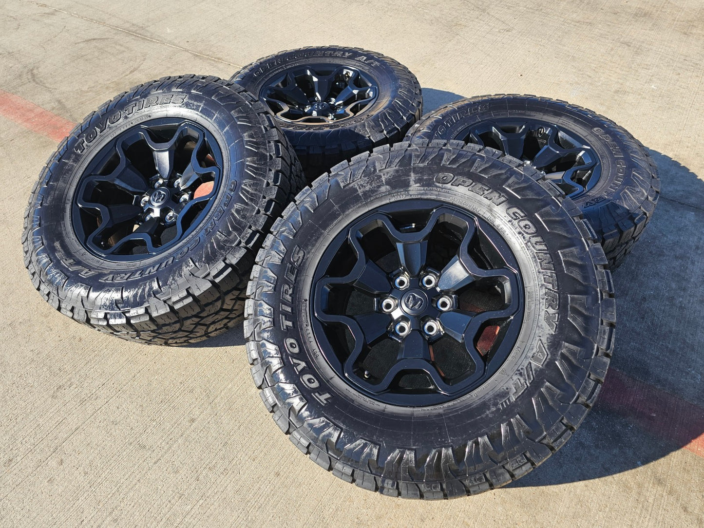 18" Dodge Ram 1500 TRX RHO Black OEM 66002 wheels rims TOYO A/T3 35"