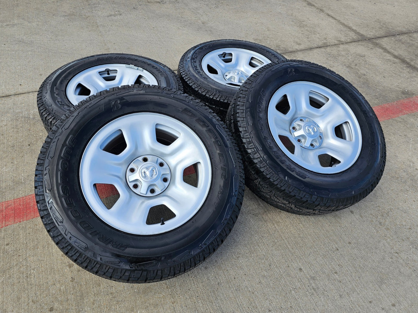 18" Dodge Ram 1500 OEM wheels rims tires BRIDGESTONE DUELER A/T NEW