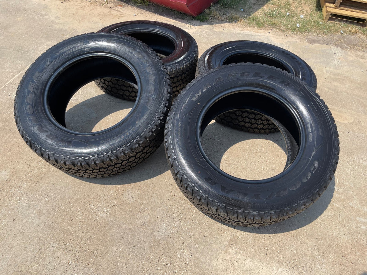(4) 255/70/18 Goodyear Wrangler A/T tires 255/70R18 LR 116HTAKE OFFS NEW