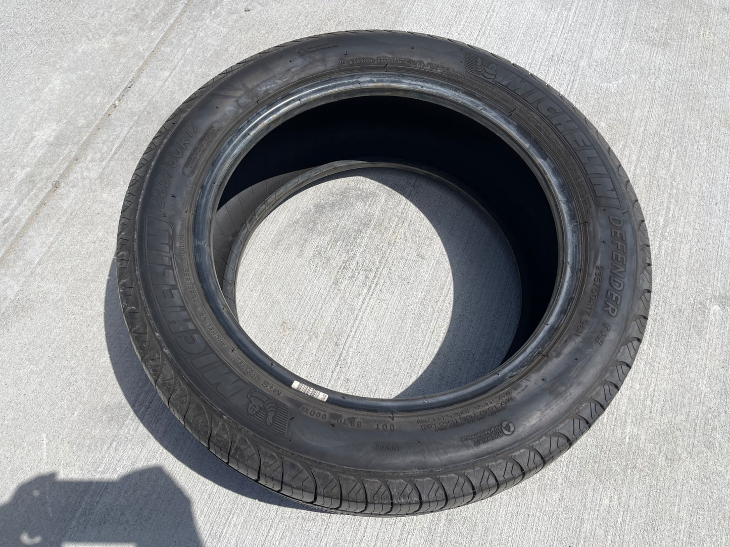 (1) 235/50/17 Michelin Defender T+H tire 235/50R17 96H XL M+S