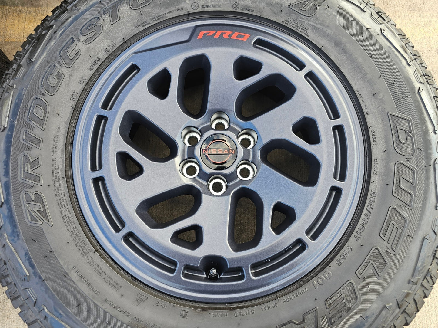 17" Nissan Frontier X-PRO OEM Desert Runner wheels rims tires DUELER A/T