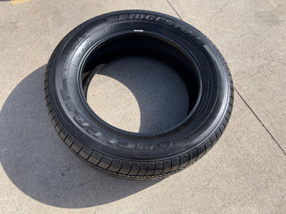 (1) 265/60/20 Bridgestone Dueler H/T tire 121R M+S 265/60R20 LT 10 ply LR E