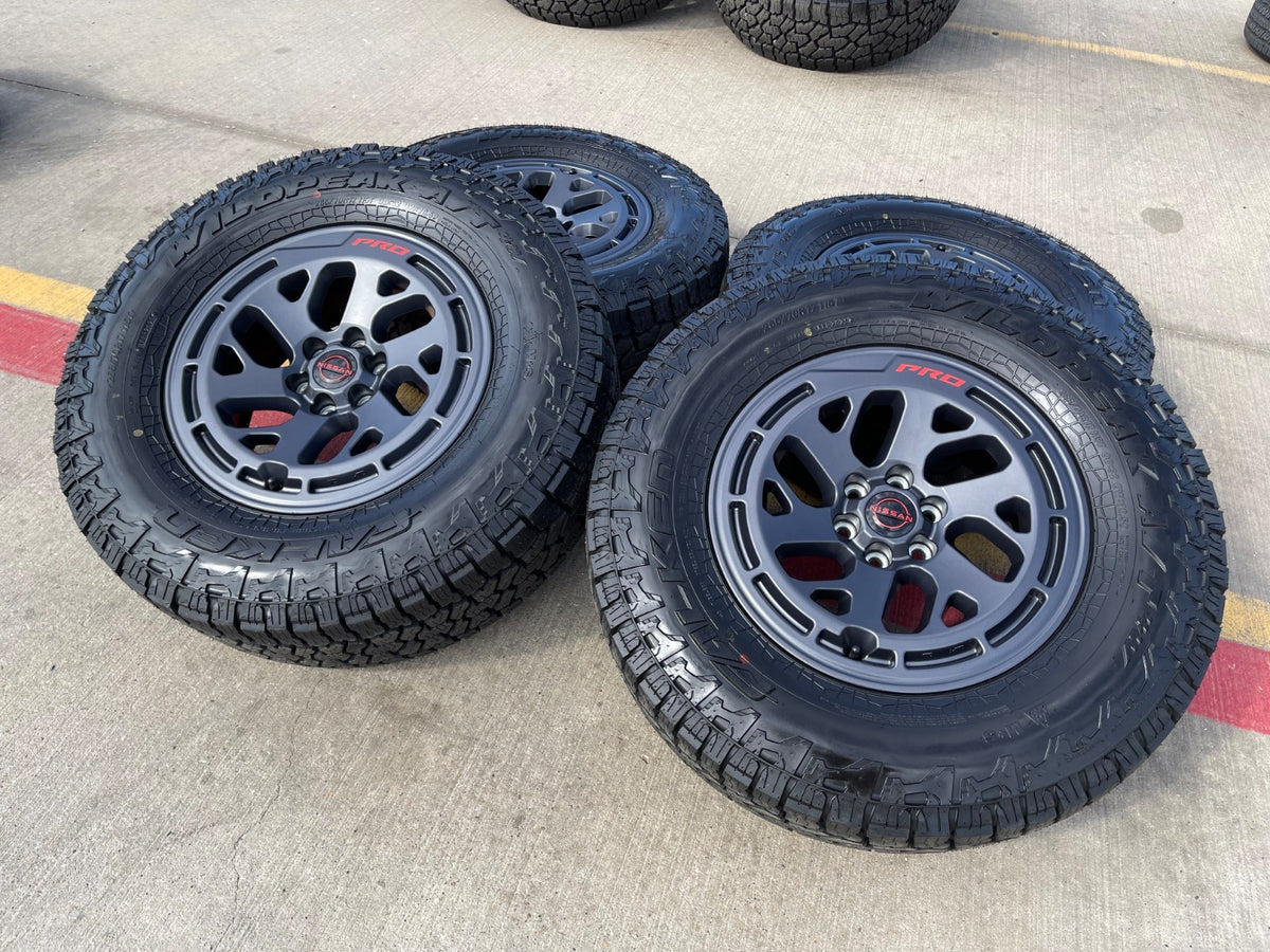 17" Nissan Frontier X-PRO OEM 62270 Desert Runner wheels rims FALKEN A/T4 NEW