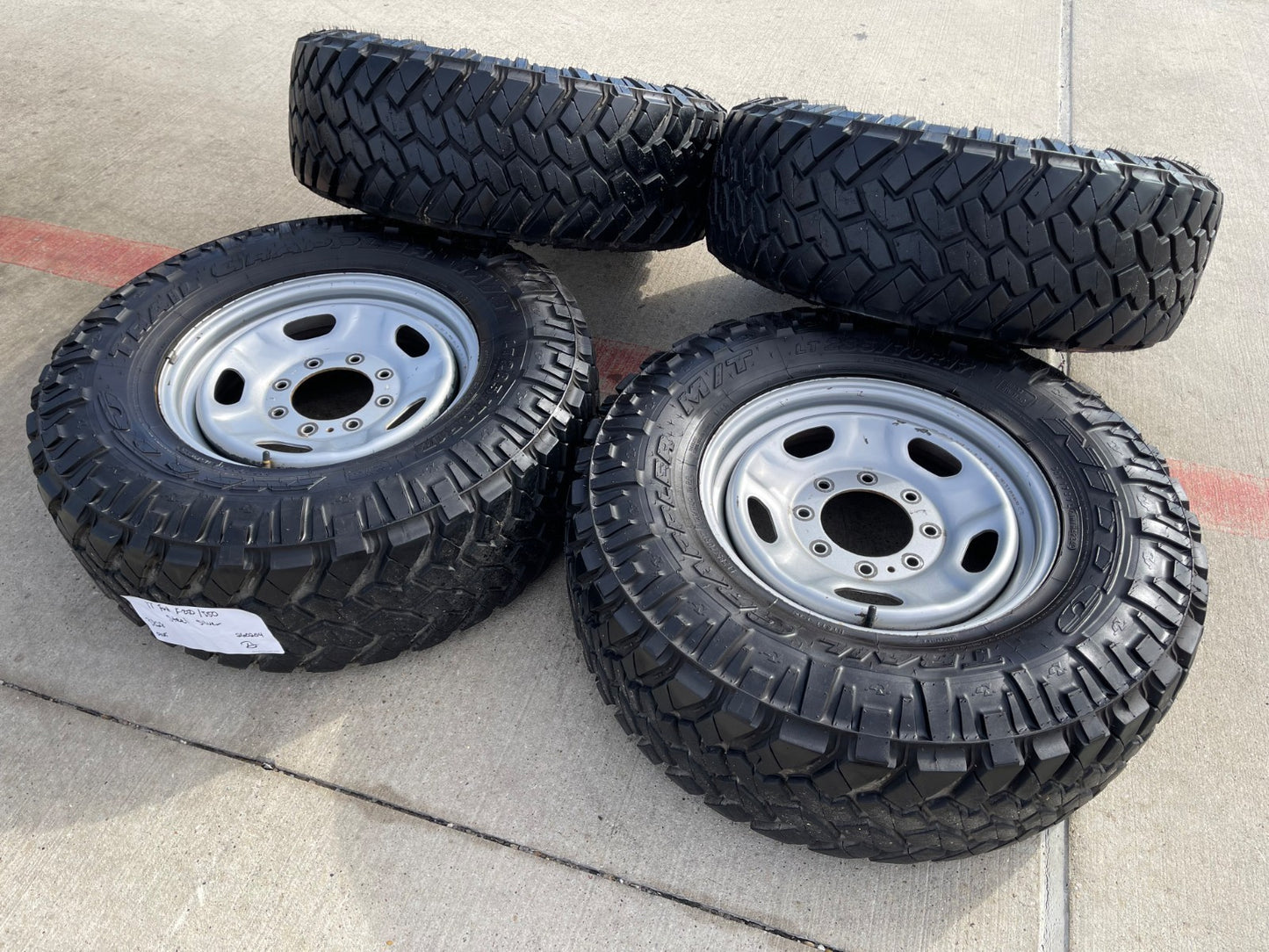 17" Ford F-250 F-350 OEM 3828 wheels rims tires NITRO GRAPLER M/T 33"