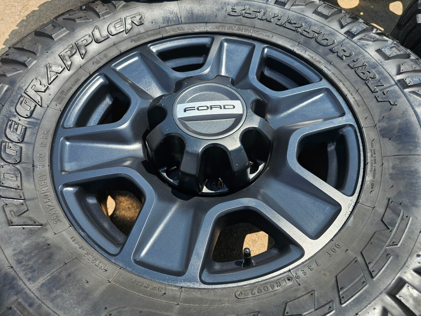 18" Ford F-250 F-350 TREMOR FX-4 OEM black wheels 10298 tires 2022 2023 2024 35"