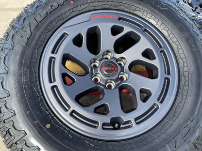 17" Nissan Frontier X-PRO OEM 62270 Desert Runner wheels rims FALKEN A/T4 NEW