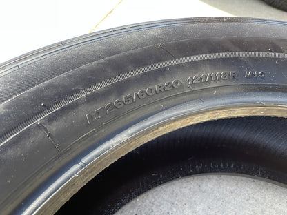 (1) 265/60/20 Bridgestone Dueler H/T tire 121R M+S 265/60R20 LT 10 ply LR E