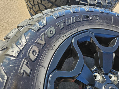 18" Dodge Ram 1500 TRX RHO Black OEM 66002 wheels rims TOYO A/T3 35"