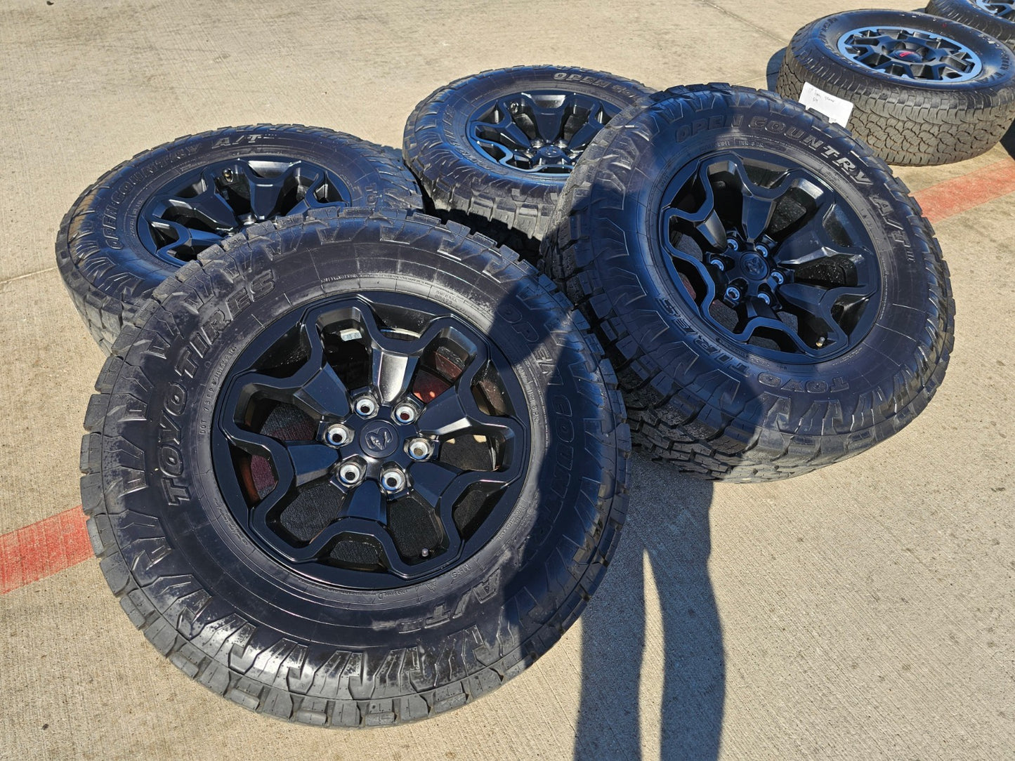 18" Dodge Ram 1500 TRX RHO Black OEM 66002 wheels rims TOYO A/T3 35"