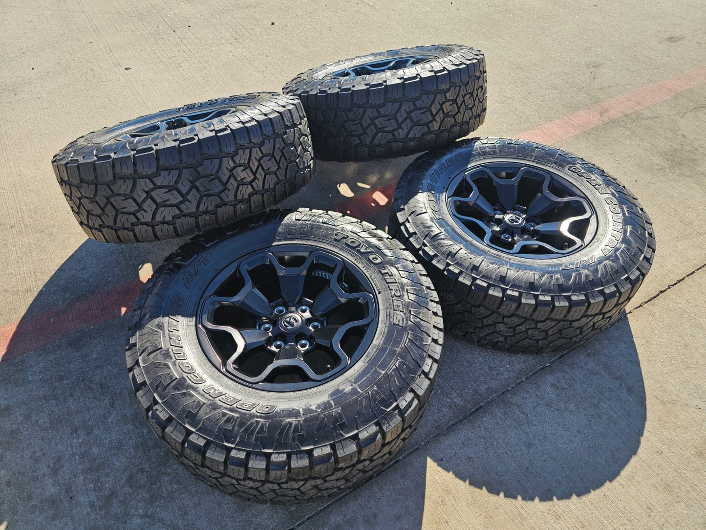 18" Dodge Ram 1500 TRX RHO Black OEM 66002 wheels rims TOYO A/T3 35"
