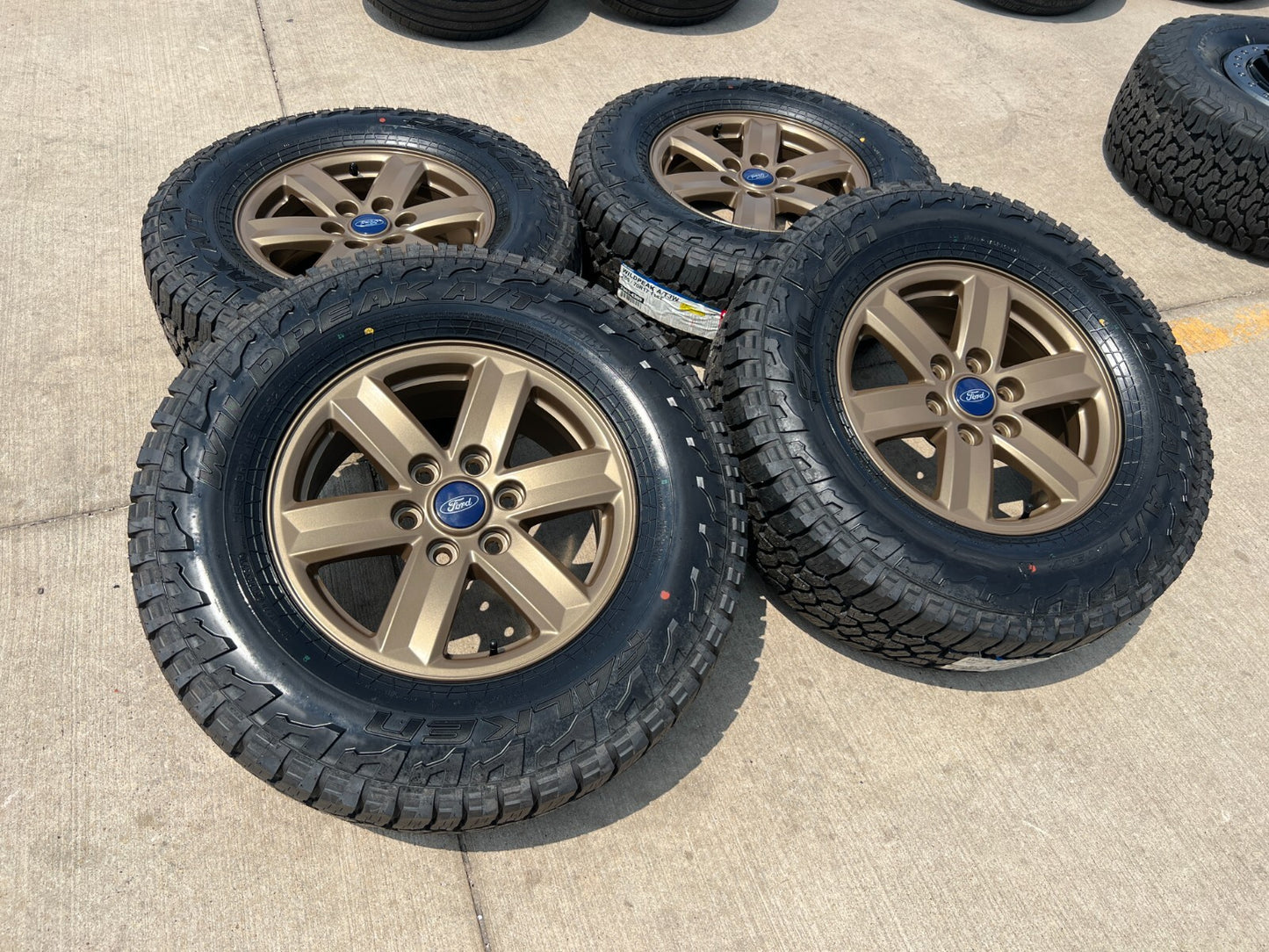 17" Ford F-150 OEM BRONZE Tremor rims wheels tires 10339 FALKEN A/T3 NEW