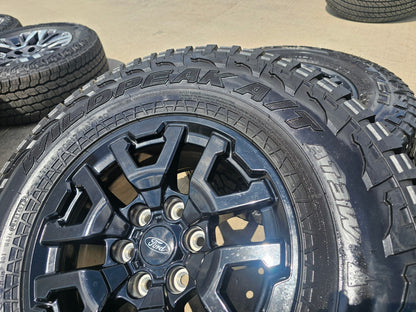 17" Ford F-150 Raptor Bronco OEM black rims wheels 10461 tires FALKEN A/T3 33"