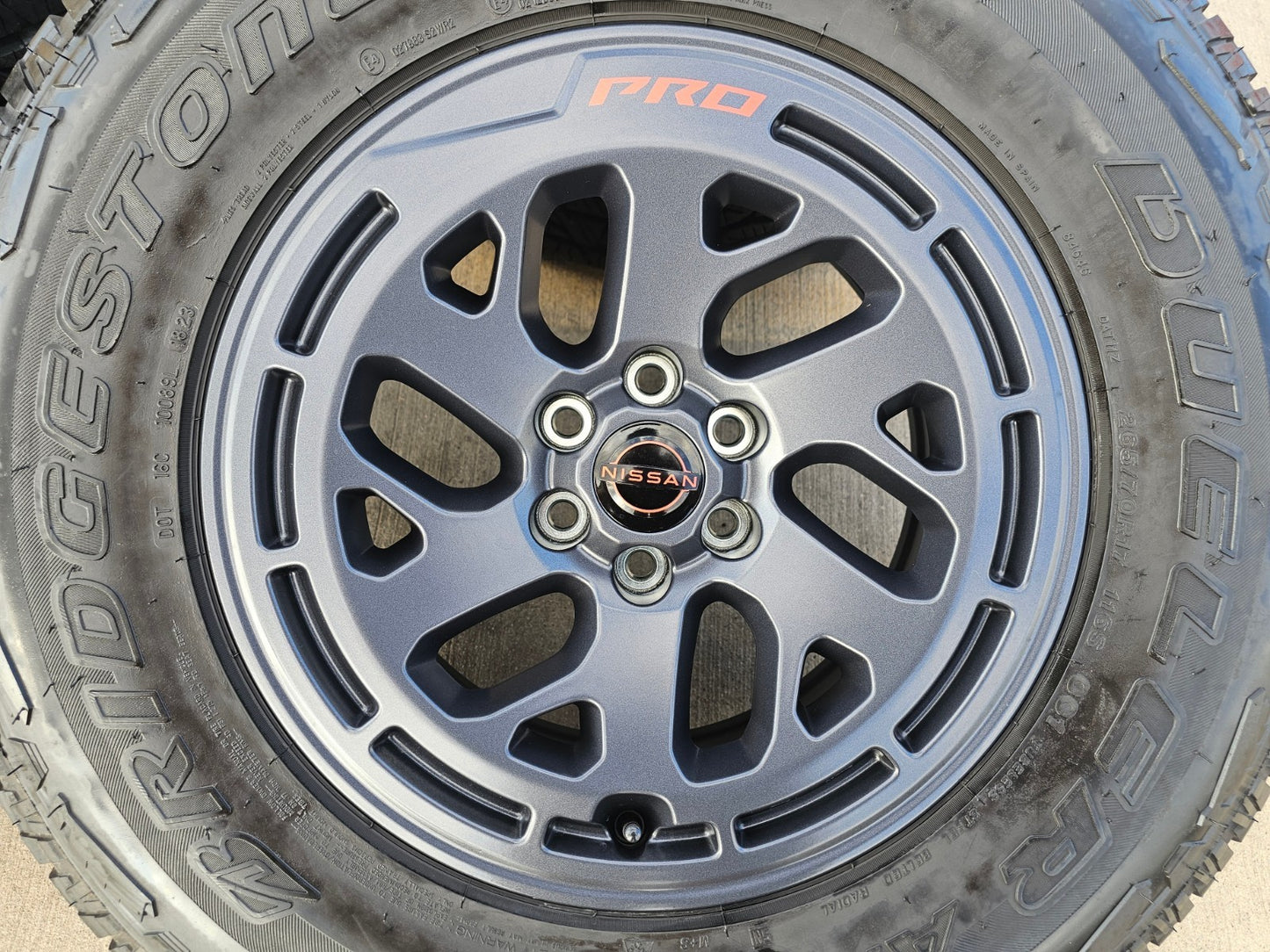 17" Nissan Frontier X-PRO OEM Desert Runner wheels rims tires DUELER A/T