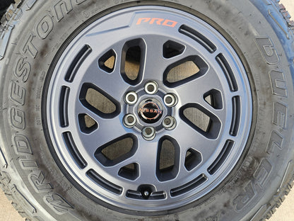 17" Nissan Frontier X-PRO OEM Desert Runner wheels rims tires DUELER A/T