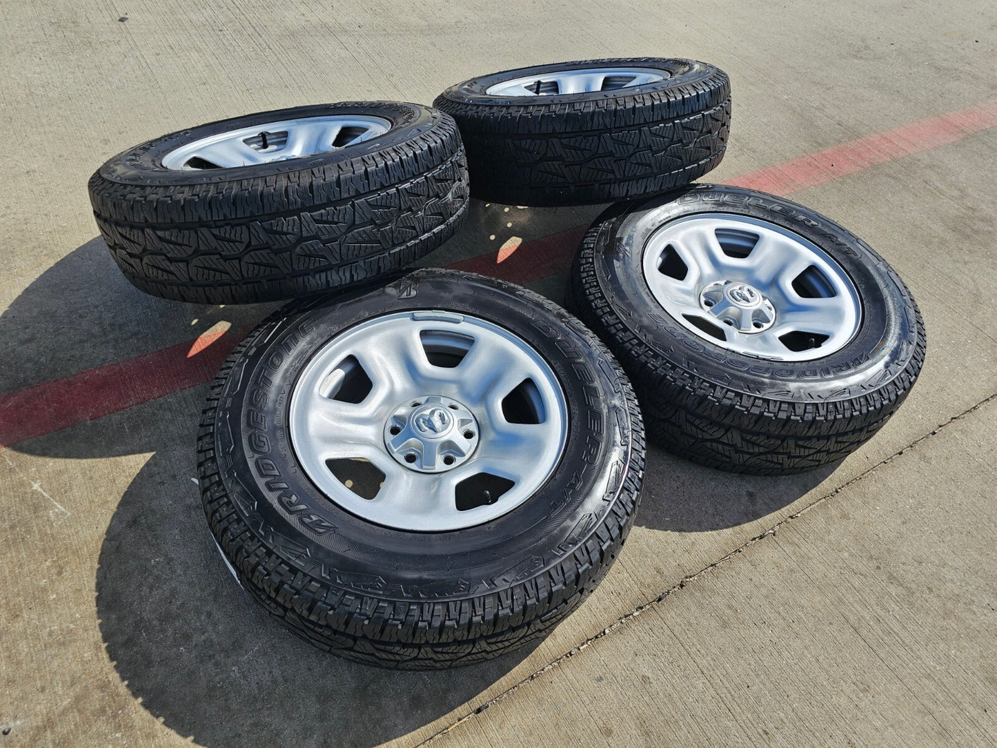 18" Dodge Ram 1500 OEM wheels rims tires BRIDGESTONE DUELER A/T NEW